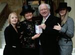  	  The family at Buckingham Palace when I collected my MBE in October 2004. 